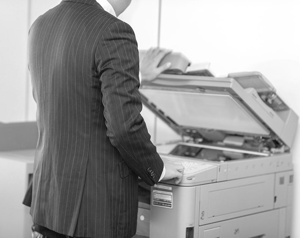 man making copies